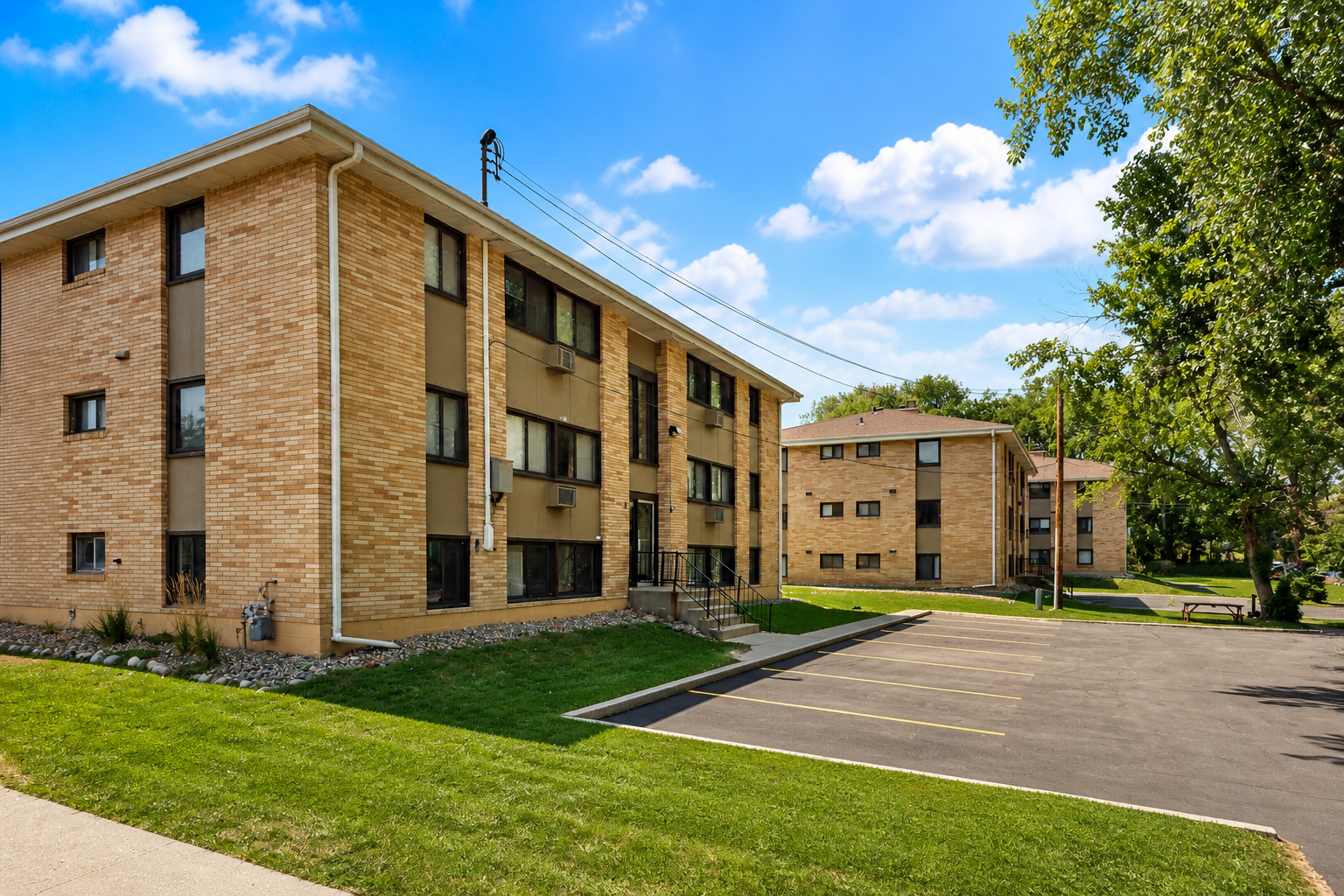 Front exterior of Grass Lake Manor Apartments at 928 Rae Drive, Richfield